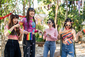 LGBTQIA Asian gay Supporters of the LGBTQ community. people having fun at LGBT pride parade. Gender Spectrum