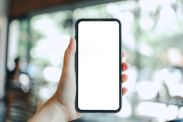 Women's hands holding cell telephone blank copy space screen. smartphone with blank white screen isolated on white background . smart phone with technology concept