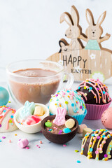 Hot cocoa bombs served with hot chocolate for Easter.