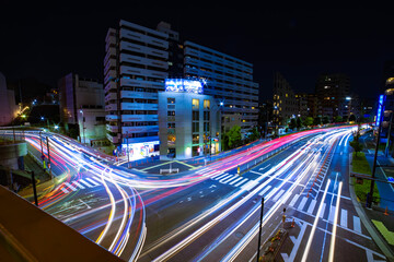 Fototapeta na wymiar A night timelapse of traffic jam at Yamate avenue in Tokyo wide shot