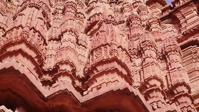 red stone ancient hindu temple architecture from unique angle at day