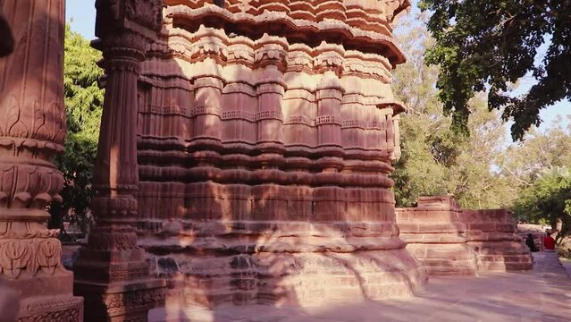 red stone ancient hindu temple architecture from unique angle at day