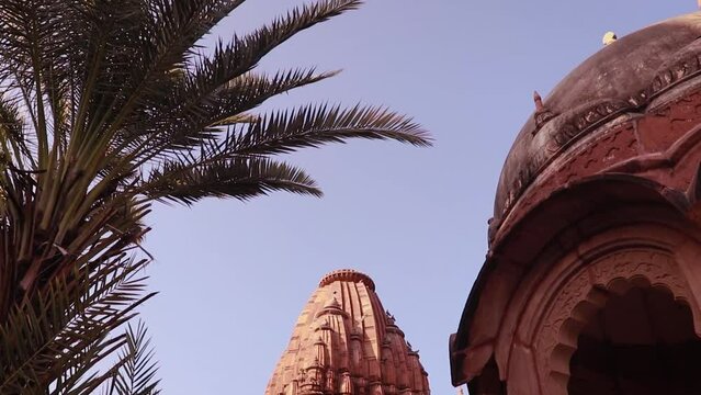 red stone ancient hindu temple architecture from unique angle at day