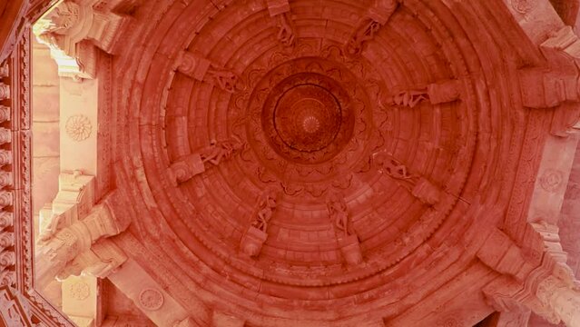 ancient hindu temple dome inside architecture from unique angle at day shot taken at mandore garden jodhpur rajasthan india.
