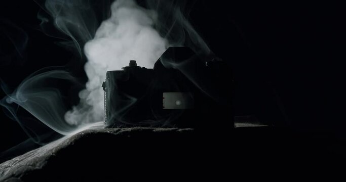 White smoke on a vintage reflex camera with no lens - 03