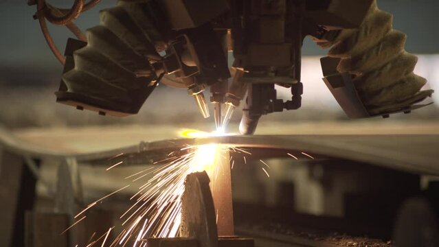 Interior of the shipyard. Welding mechanization. Making a new big ship. Attractive. Spark in camera.