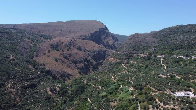 Aerial view across Topolia gorge, canyon and lush mountain valley, Crete, Greece