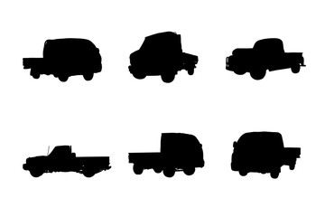 Set of silhouettes of pickup trucks vector design © ydhckll