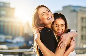 I count my blessings twice when I count you. Shot of young female friends spending the day outside.
