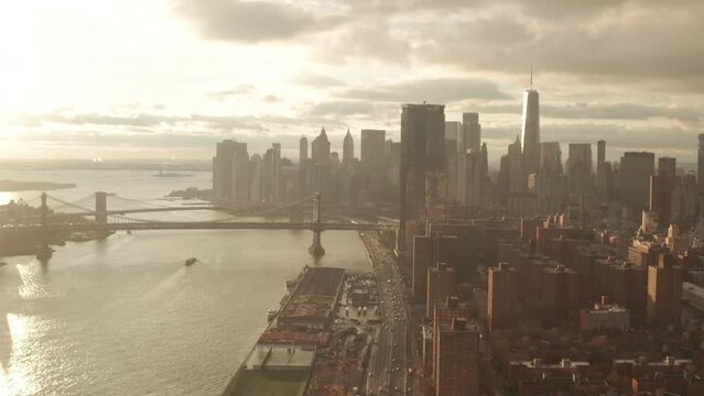 Aerial shot over FDR drive towards New York City Financial District