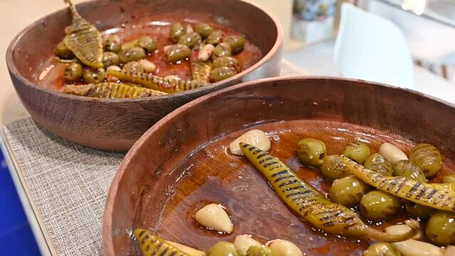 Grilled green olive pickles are displayed during the Gulf Food exhibition, United Arab Emirates