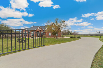 a farmhouse with a private driveway