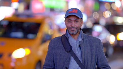 Afro-American Man in the streets of New York at Times Square - travel photography
