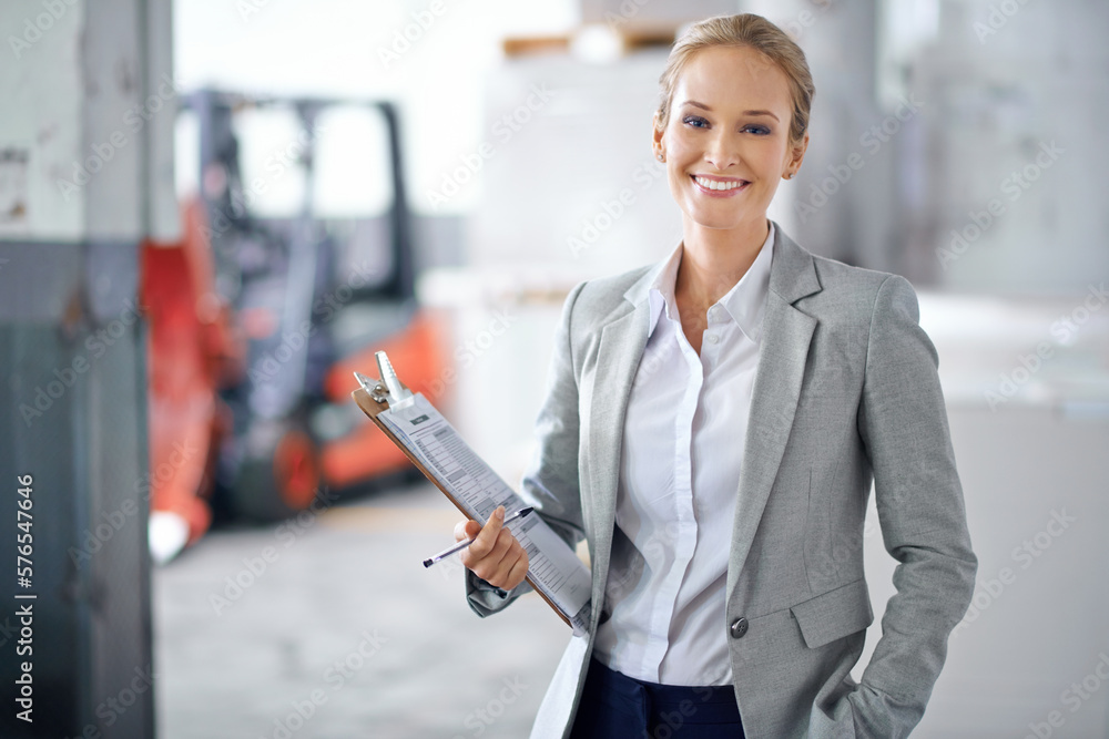Aufkleber I ensure success every step of the way. A young manager looking confident while on the factory floor.