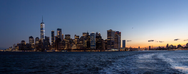 Panoramic View of Manhattan from the water during sunrise and clear skies