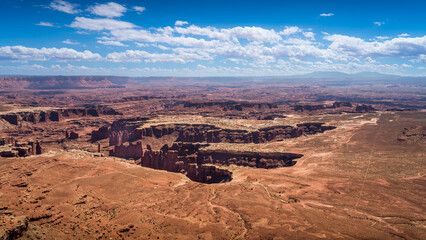 Deep Ravines and Canyons seen from the Grand View Point Overlook in Canyonlands National Park, Utah, United States - Powered by Adobe
