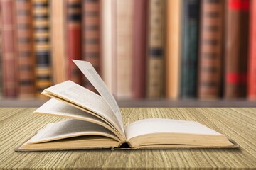 Open Holy Bible book on the desk
