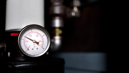 pressure gauge meter installed on air pump in factory.