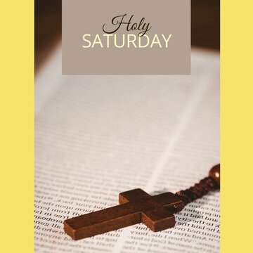 Image of holy saturday text over cross and bible