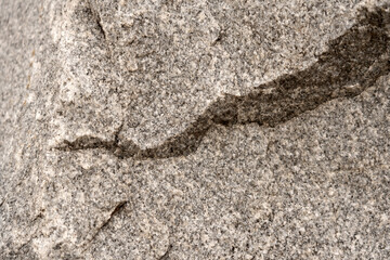 Gray grunge banner. Natural gray granite stone texture background Abstract stone background. The texture of the stone wall. Close-up. Light gray stone background.