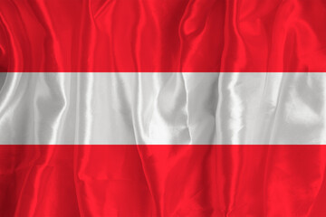 The flag of Austria on a silk background is a great national symbol. Fabric texture The official state symbol of the country. Austrian flag background
