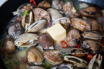 Today's menu is steamed clams with butter