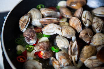 Today's menu is steamed clams with butter