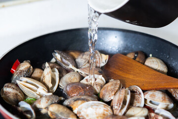 Today's menu is steamed clams with butter