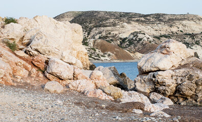 Wild mediterranean sea with rocky shore and crystal clear water close-up.