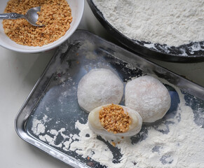 Chinese popular snacks. Homemade Chinese Peanut Mochi aka Lo Mai Chi. Fun and easy to make with common ingredients around the house. Ideal for breakfast, before and after meals snack and tea break