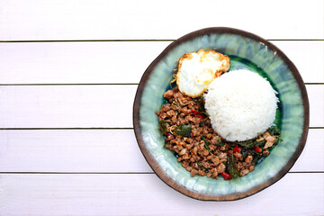 Rice with stir-fried pork and holy basil, fried egg.