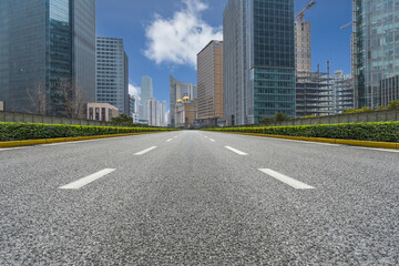 city road through modern buildings in beijing.