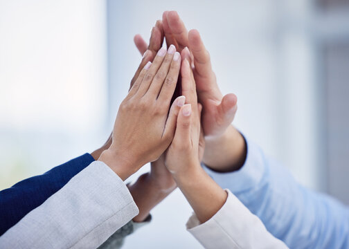 Solidarity, high five and support with hands of business people in office for teamwork, celebration or motivation. Commitment, victory and success with group of friends for achievement, unity or deal
