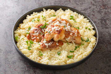 Homemade creamy rice cooked with white wine, broth, parmesan and garlic served with fried chicken...