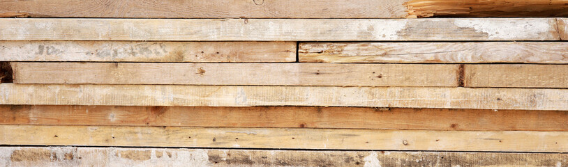 Fototapeta premium wooden background with pile of planks 