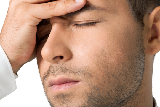 Young businessman with a big headache or problem