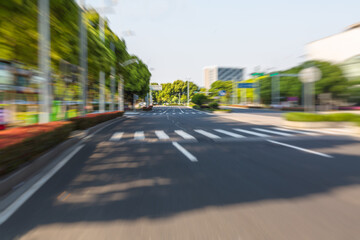 empty asphalt road through modern city in China.