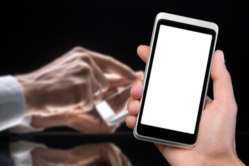 Hand hold modern smartphone with a blank screen