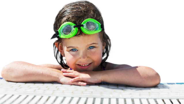 Beautiful girl in sunglasses at swimming pool in summer time