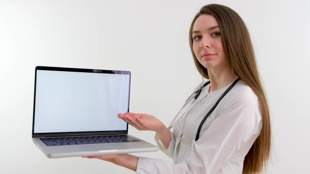 doctor holding tablet with blank screen for copy space. Female physician in uniform at hospital office. Medicine, healthcare and technology concept, copy space. High quality photo