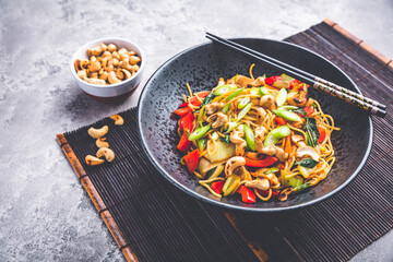 Stir Stir fry noodles with chicken, vegetables and  roasted cashew nuts