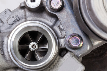 Turbo charger installed for power booster torque drive on white isolated background. Auto service...