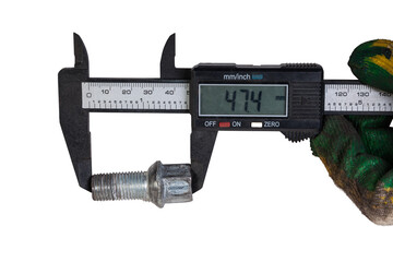 Measuring the length of the bolt with an electronic caliper. Tools and industry. - obrazy, fototapety, plakaty