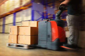 Speed Motion of Workers Unloading Package Boxes on Pallets in Storage Warehouse. Electric Forklift...