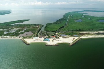 Obraz premium Gura Portitei. Aerial view over Gura Portiei beach resort in Danube Delta, at the Black Sea shore. Landmarks of Romania.
