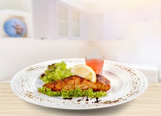 Tasty fresh Dish with fish fillet and salad