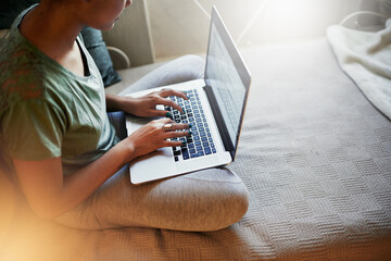 Making study notes. High angle shot of a young female student studying at home.