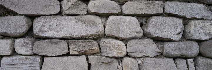 Stone old wall fencing seamless texture closeup