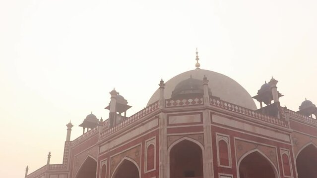 humayun tomb at misty morning from unique perspective