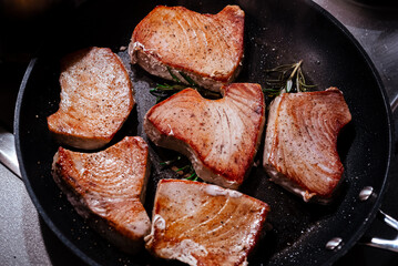 Seared tuna steaks on a pan